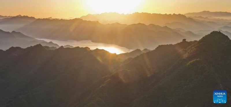 An aerial drone photo taken on June 1, 2026 shows the scenery of the Great Wall at sunrise in Qianxi County, Tangshan City in north China's Hebei Province. (Photo by Liu Mancang/Xinhua)