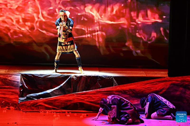 Actors take part in the performance of Gan Gong Bird at a theatre in Baoting, south China's Hainan Province, May 30, 2026. The original ethnic dance drama Gan Gong Bird has been staged here for free every Saturday to enrich people's cultural life. (Xinhua/Pu Xiaoxu)
