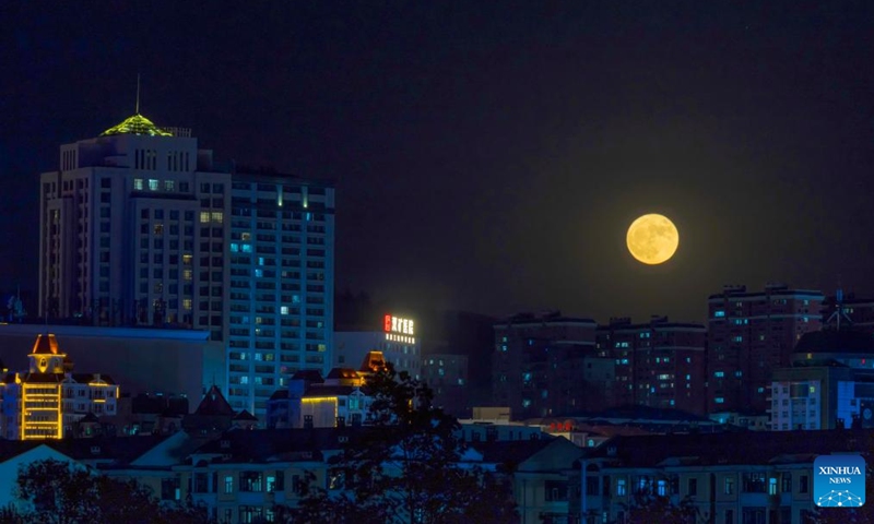 The full moon, known as the Blue Moon, is seen over Shuangyashan City, northeast China's Heilongjiang Province, May 31, 2026. (Photo by Han Yang/Xinhua)