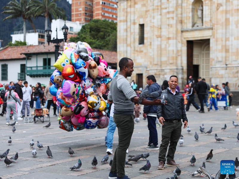 People spend their time at the Bolivar Square in Bogota, capital of Colombia, May 30, 2026. (Xinhua/Zhou Jiayi)