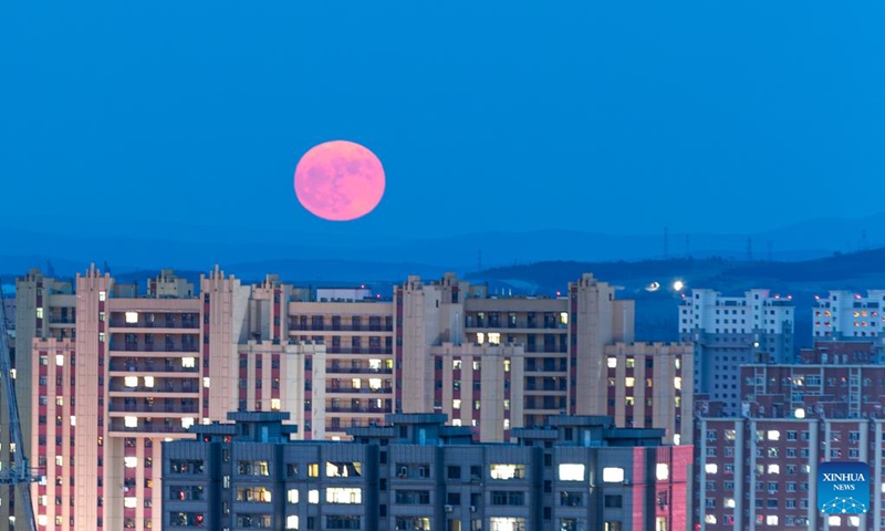 The full moon, known as the Blue Moon, is seen over Jiamusi City, northeast China's Heilongjiang Province, May 31, 2026. (Photo by Chen Zhiguo/Xinhua)