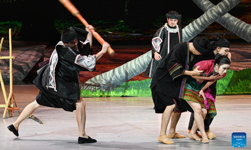 Actors take part in the performance of Gan Gong Bird at a theatre in Baoting, south China's Hainan Province, May 30, 2026. The original ethnic dance drama Gan Gong Bird has been staged here for free every Saturday to enrich people's cultural life. (Xinhua/Pu Xiaoxu)
