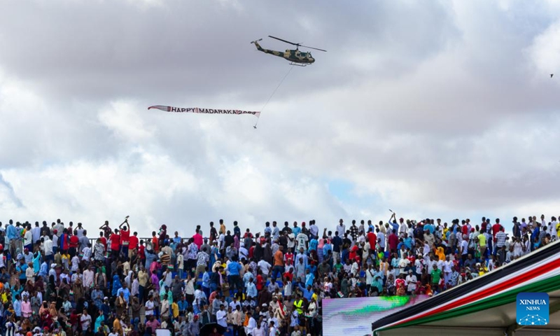 A helicopter towing a banner flies over Wajir Stadium in Wajir County, northeastern Kenya, June 1, 2026. Kenya on Monday held Madaraka Day celebrations to commemorate the day in 1963 that the East African country attained self-rule. (Photo: Xinhua)