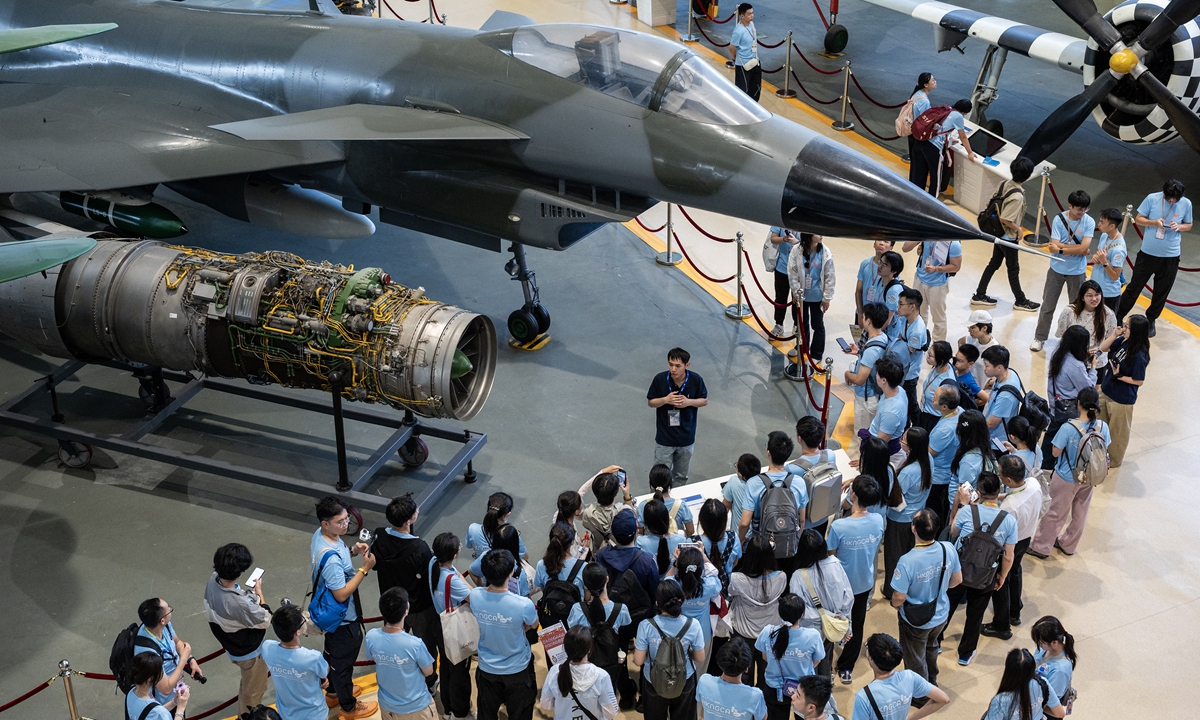 Over 100 student representatives from 11 universities in South China's Hong Kong Special Administrative Region (HKSAR) visit the prototype of China's J-10A fighter jet on display at the Beijing Municipality Air and Space Museum, situated on the campus of Beihang University in Beijing, on June 1, 2026. Photo: CNS Photo
