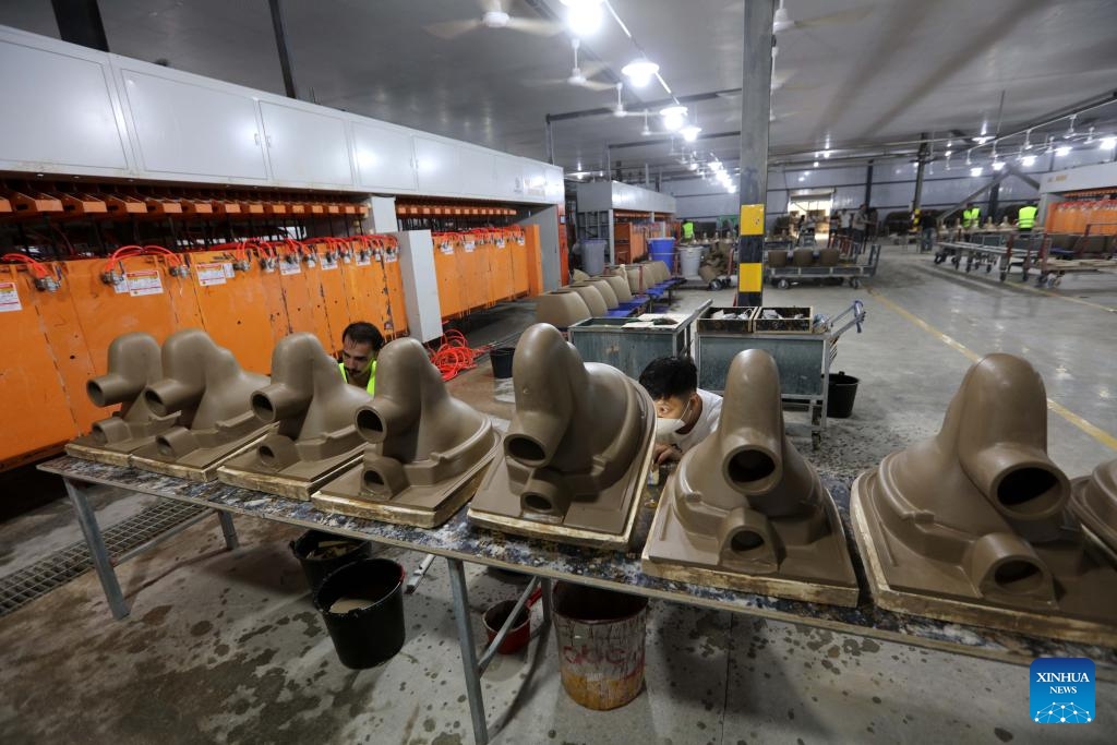 Employees work at a Chinese-invested sanitary ware factory in Karak, Jordan, on May 31, 2026. The Chinese-invested sanitary ware factory was inaugurated in southern Jordan on Sunday. With an investment of 80 million U.S. dollars, the facility was developed by Jincheng Global Ceramic Company, a Chinese private enterprise which manufactures a wide range of products, including porcelain, electrical appliances, stainless steel products, lighting equipment, sanitary ware, and cardboard packaging. (Photo: Xinhua)