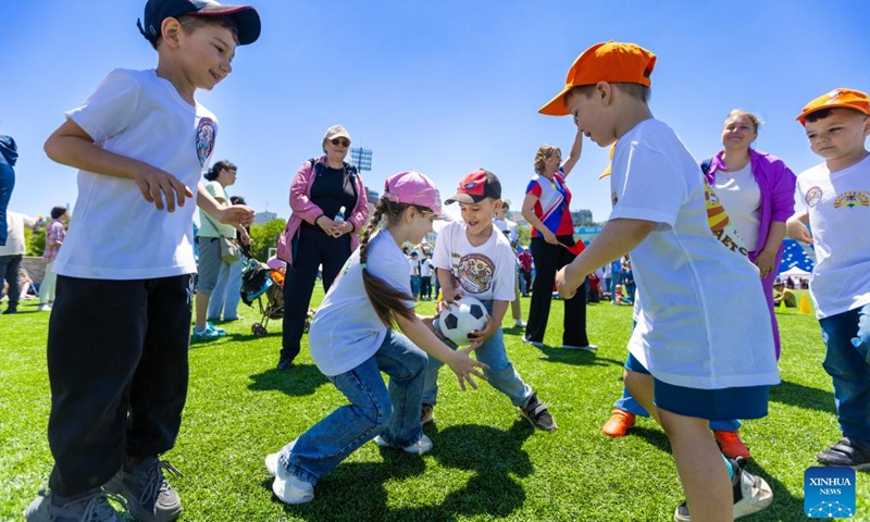 Children play games during a Happy Childhood Festival in Vladivostok, Russia, May, 31, 2026. (Photo: Xinhua)