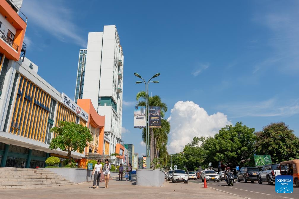 People walk along a street in Vientiane, the capital of Laos, May 31, 2026. (Photo: Xinhua)