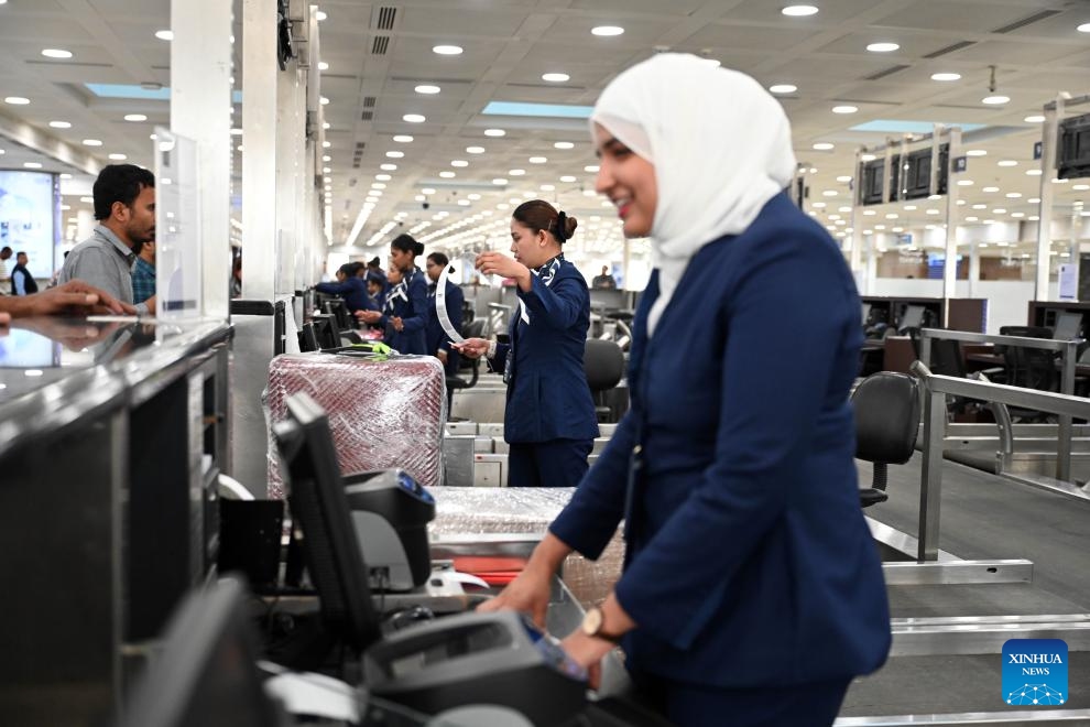 Airlines staff members conduct check-in in Terminal 1 at Kuwait International Airport in Farwaniya Governorate, Kuwait, June 1, 2026. Kuwait International Airport resumed operations on Monday, receiving and operating flights from Arab and international airlines as part of a phased reopening plan following the completion of repair and upgrade work. (Photo: Xinhua)