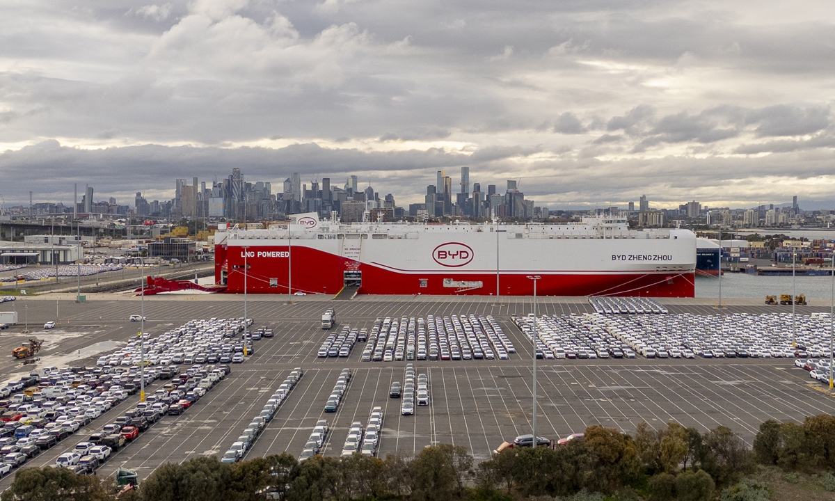 A shipment of 5,000 hybrid and electric vehicles (EVs) are offloaded from freighter BYD Zhengzhou on June 2, 2026 with the city of Melbourne, Australia in the background. BYD Zhengzhou, one of a fleet of eight car-carrying ships owned and operated by the EV giant, was dispatched to Australia following a spike in interest in EVs in March, setting a record for the largest EV shipment to the country. Photo: VCG