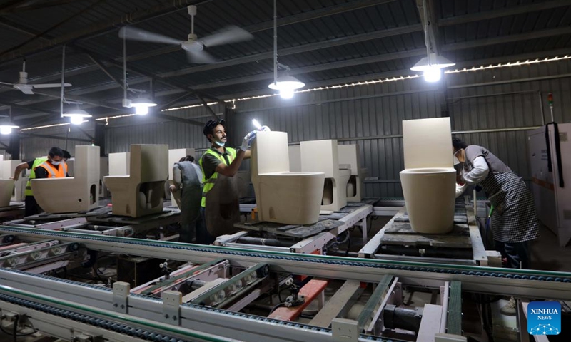 Employees work at a Chinese-invested sanitary ware factory in Karak, Jordan, on May 31, 2026. The Chinese-invested sanitary ware factory was inaugurated in southern Jordan on Sunday. With an investment of 80 million U.S. dollars, the facility was developed by Jincheng Global Ceramic Company, a Chinese private enterprise which manufactures a wide range of products, including porcelain, electrical appliances, stainless steel products, lighting equipment, sanitary ware, and cardboard packaging. (Photo: Xinhua)