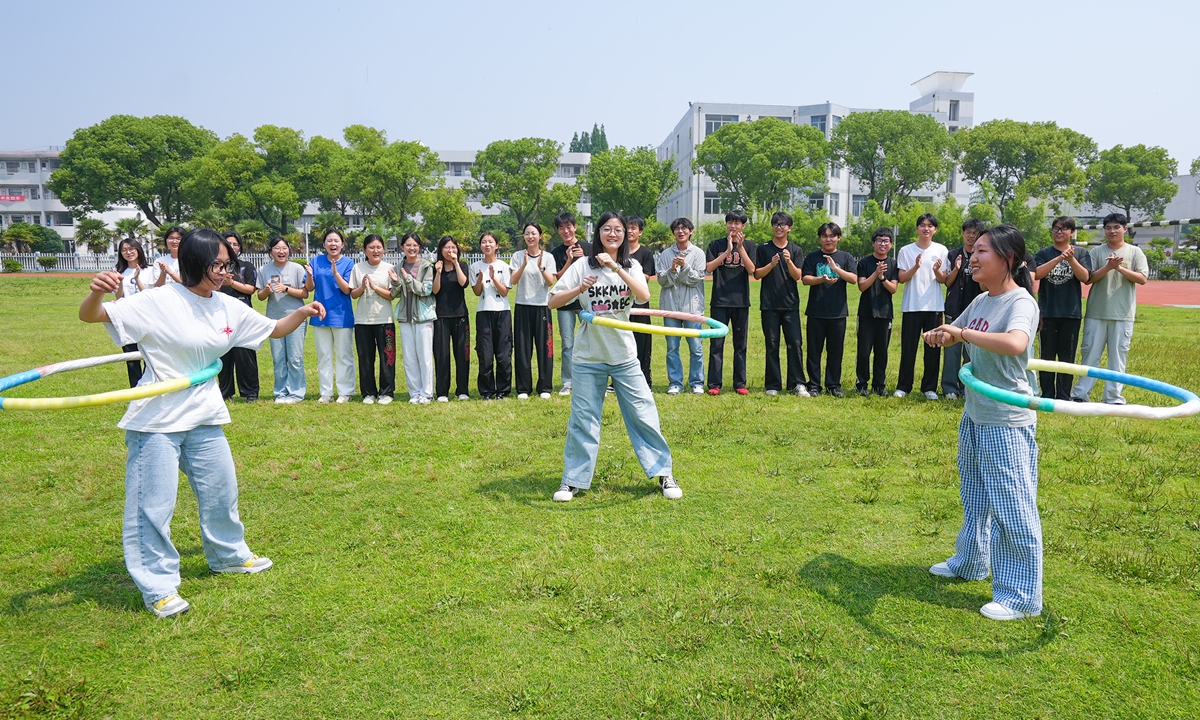 Final-year senior high students from a school in Xinghua, East China's Jiangsu Province, turn to gaming on June 2, 2026, as a stress reliever ahead of the national college entrance examination.