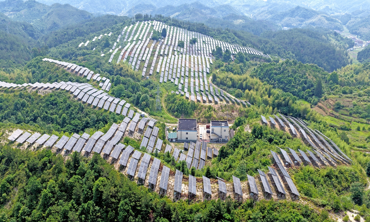 Photovoltaic (PV) panels of the agri-PV complementary power station generate green energy under the sun in Xianju county of East China's Zhejiang Province on June 3, 2026. By introducing PV power generation projects, the county has promoted local economic development. Photo: VCG