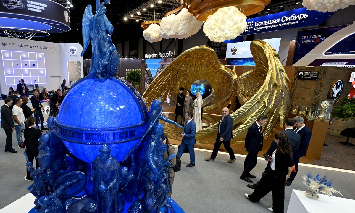Participants tour an exhibition of the St. Petersburg International Economic Forum in Saint Petersburg, Russia, on June 3, 2026. Photo: VCG