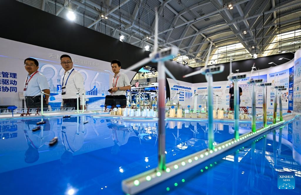 Participants view exhibits during the 4th Tianjin International Shipping Industry Expo in north China's Tianjin, on June 2, 2026. With the theme of Shipping to the World and Navigating towards the Future, the expo kicked off in Tianjin on Tuesday. This year's expo has attracted over 400 exhibitors and is expected to draw over 60,000 visitors. (Photo: Xinhua)