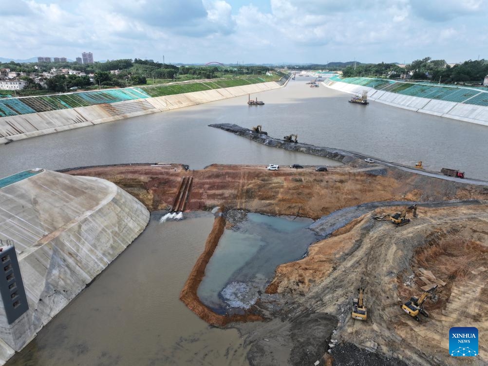 An aerial drone photo taken on June 3, 2026 shows water being pumped into the Qishi hub on the Pinglu Canal in south China's Guangxi Zhuang Autonomous Region. Water began flowing through the final sections of the Pinglu Canal on Wednesday, bringing the long-awaited shortcut to the coast in south China a step closer to opening for navigation. As water was pumped into the canal on Wednesday morning, the 134.2-kilometer waterway has now achieved full-channel connectivity and entered the final phase ahead of its expected inauguration in September. (Photo: Xinhua)