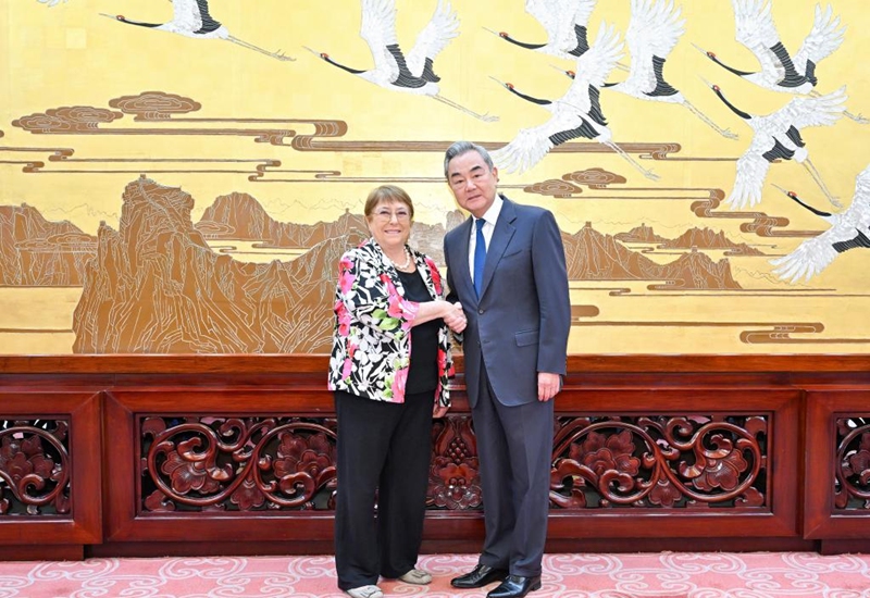 Chinese Foreign Minister Wang Yi, also a member of the Political Bureau of the Communist Party of China Central Committee, meets with Michelle Bachelet, candidate for the next United Nations (UN) secretary-general and former Chilean President, in Beijing, capital of China, June 4, 2026. (Xinhua/Yue Yuewei)