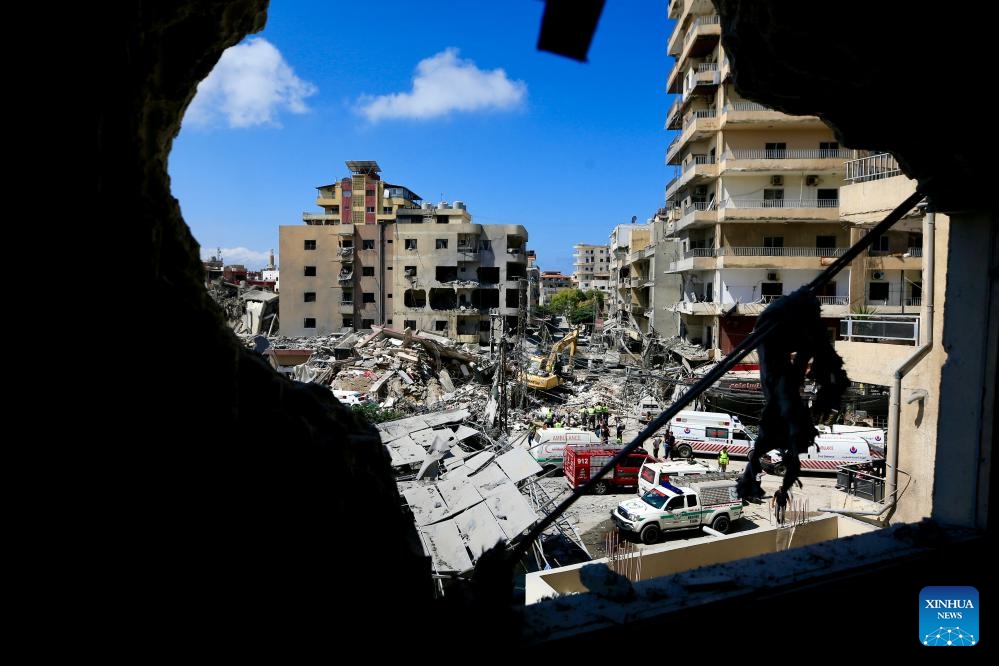 Photo taken on June 2, 2026 shows rescuers work on the ruins of residential buildings after Israeli airstrike in Tyre, southern Lebanon. (Photo: Xinhua)