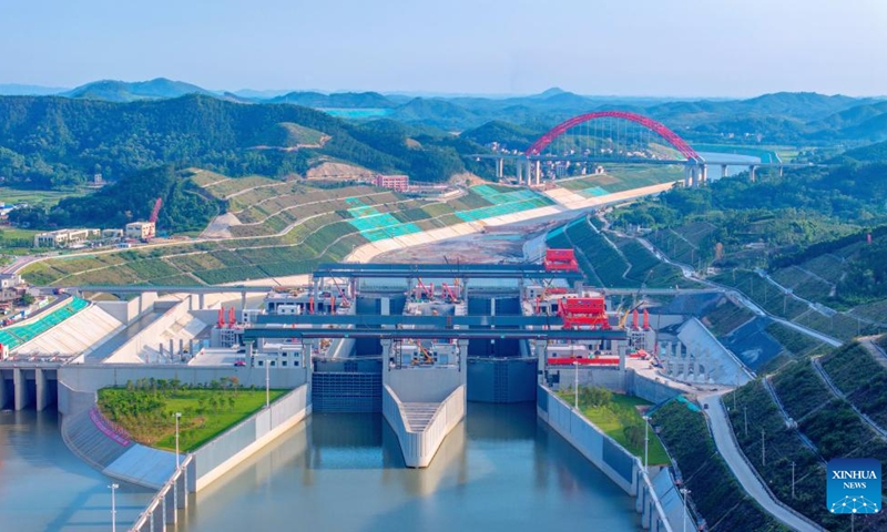 An aerial drone photo taken on June 3, 2026 shows water being pumped into the Madao hub on the Pinglu Canal in south China's Guangxi Zhuang Autonomous Region. Water began flowing through the final sections of the Pinglu Canal on Wednesday, bringing the long-awaited shortcut to the coast in south China a step closer to opening for navigation. As water was pumped into the canal on Wednesday morning, the 134.2-kilometer waterway has now achieved full-channel connectivity and entered the final phase ahead of its expected inauguration in September. (Photo: Xinhua)