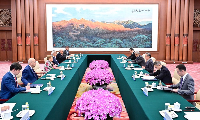 Chinese Foreign Minister Wang Yi, also a member of the Political Bureau of the Communist Party of China Central Committee, meets with Michelle Bachelet, candidate for the next United Nations (UN) secretary-general and former Chilean President, in Beijing, capital of China, June 4, 2026. (Xinhua/Yue Yuewei)