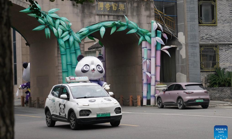 This photo taken on June 2, 2026 shows giant panda-themed decorations in Muping Town of Baoxing County of Ya'an City, southwest China's Sichuan Province. The giant panda ancient town, a national 4A-level scenic spot, is located in Muping Town of Baoxing County. Currently, more than 80 percent of the county area forms part of the Giant Panda National Park, which was established in 2021 and spans 27,000 square km across three provinces -- Sichuan, Shaanxi and Gansu. (Photo: Xinhua)