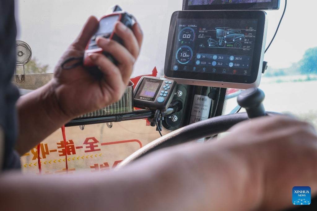 This photo taken on June 3, 2026 shows a smart screen inside the cabin of a harvester at a smart farm in Zhengwu Town of Fuyang City, east China's Anhui Province. The wheat harvest season recently started in various places across Anhui. At a smart farm in Fuyang City, a range of smart devices have been deployed to assist in crop monitoring and harvesting operations. (Photo: Xinhua)