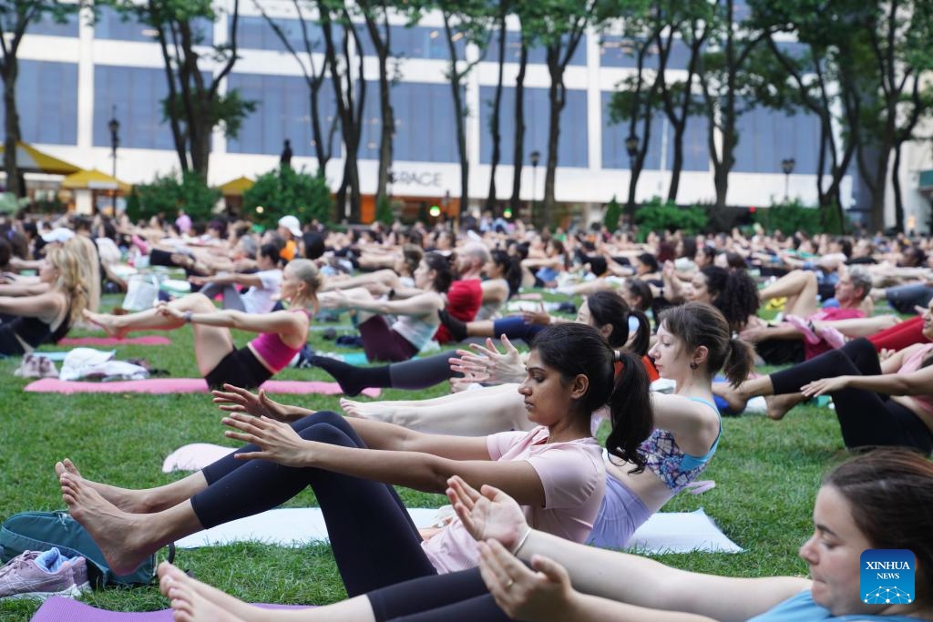 People attend an open-air yoga class at Bryant Park in New York, the United States, on June 3, 2026. An open-air yoga class was held on Wednesday at Bryant Park in New York, starting the open air activities of this summer season. (Photo: Xinhua)