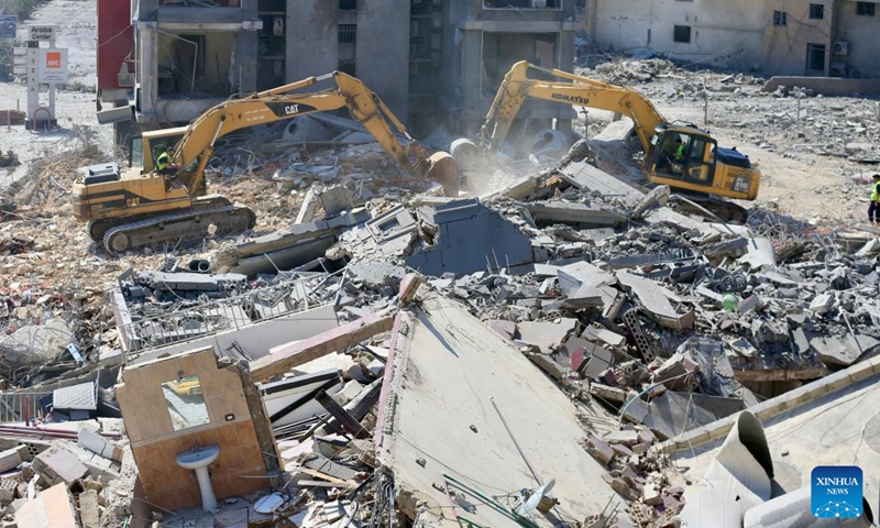 Photo taken on June 2, 2026 shows rescuers work on the ruins of residential buildings after Israeli airstrike in Tyre, southern Lebanon. (Photo: Xinhua)