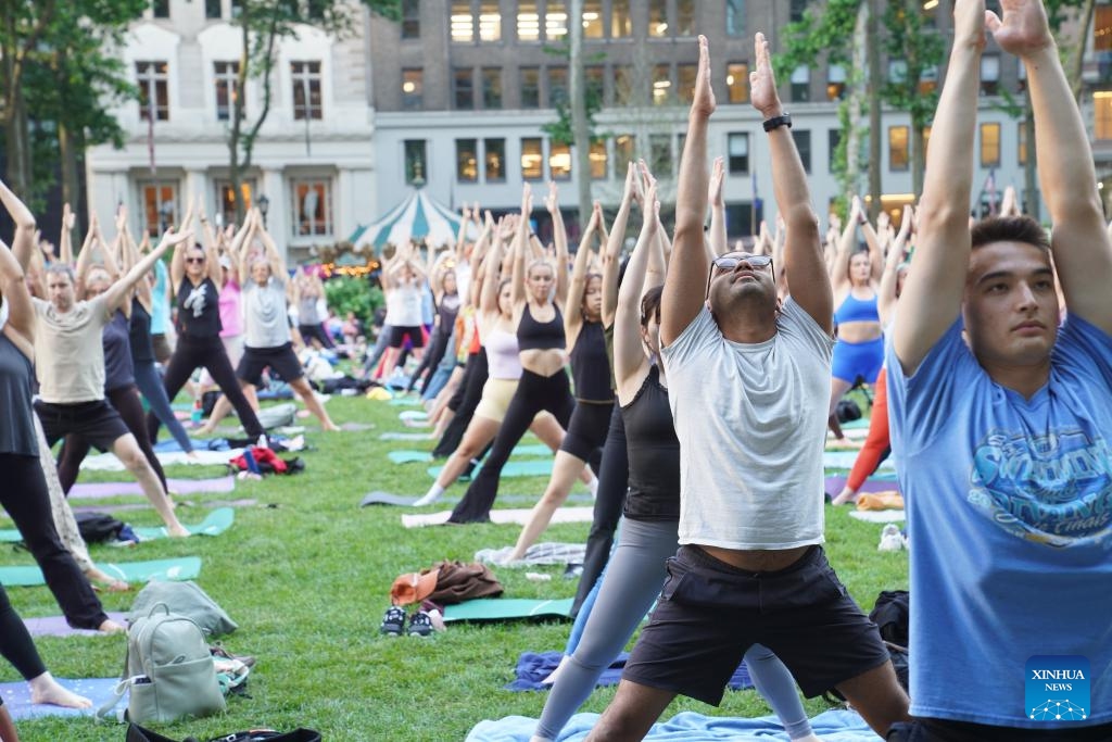 People attend an open-air yoga class at Bryant Park in New York, the United States, on June 3, 2026. An open-air yoga class was held on Wednesday at Bryant Park in New York, starting the open air activities of this summer season. (Photo: Xinhua)