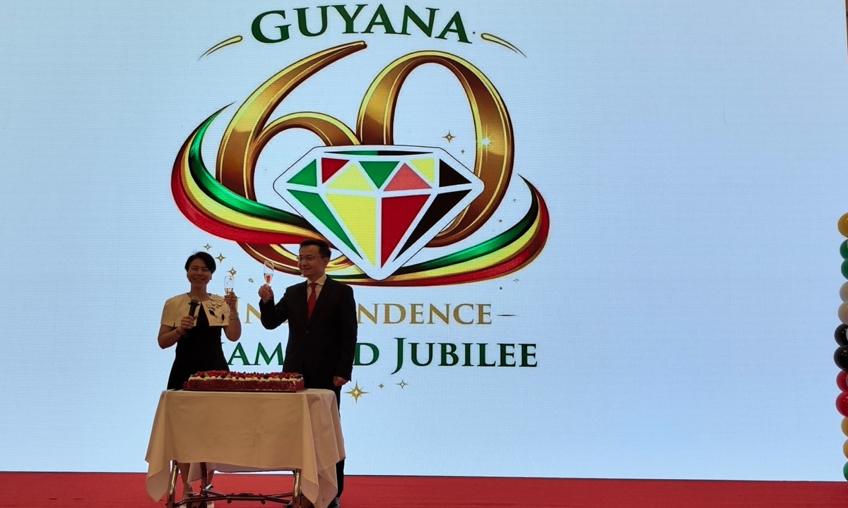 Anyin Choo, ambassador of Guyana to China (left), and Zhang Run, director general of the Department of Latin American and Caribbean Affairs of the Ministry of Foreign Affairs of China, toast at the reception in Beijing on May 29, 2026. Photo: Dong Feng/GT