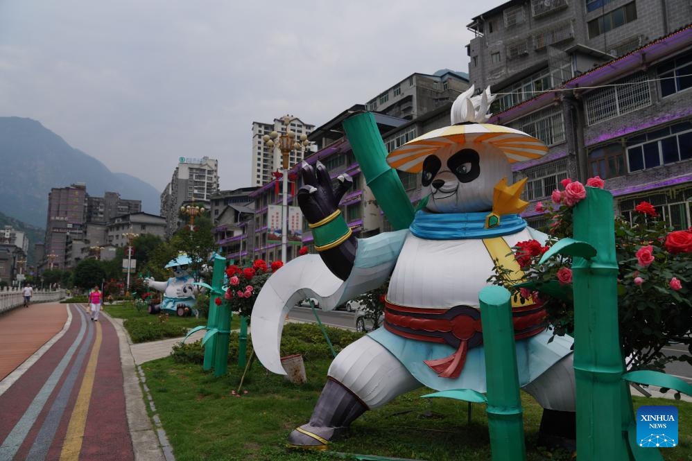 This photo taken on June 2, 2026 shows giant panda-themed decorations in Muping Town of Baoxing County of Ya'an City, southwest China's Sichuan Province. The giant panda ancient town, a national 4A-level scenic spot, is located in Muping Town of Baoxing County. Currently, more than 80 percent of the county area forms part of the Giant Panda National Park, which was established in 2021 and spans 27,000 square km across three provinces -- Sichuan, Shaanxi and Gansu. (Photo: Xinhua)