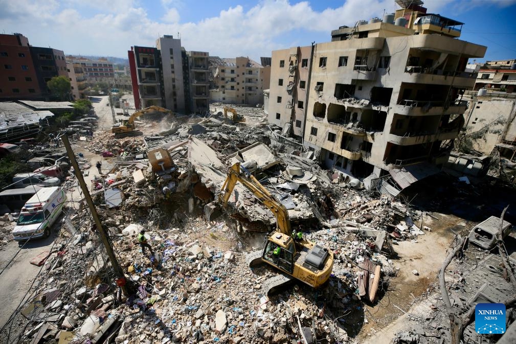 Photo taken on June 2, 2026 shows rescuers work on the ruins of residential buildings after Israeli airstrike in Tyre, southern Lebanon. (Photo: Xinhua)