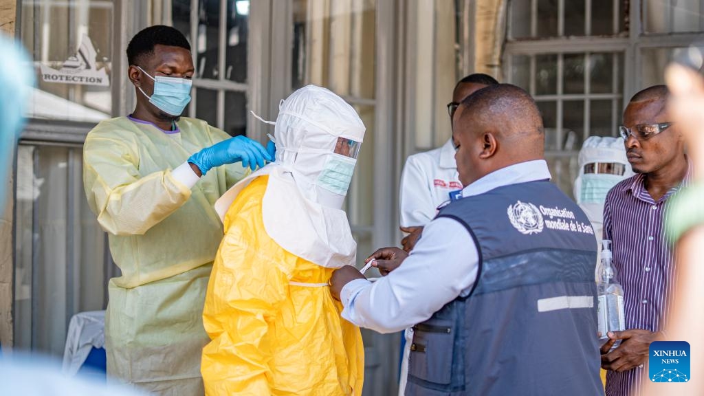 A medical worker puts on a protective suit in Goma, the Democratic Republic of the Congo (DRC), on June 4, 2026. (Xinhua)