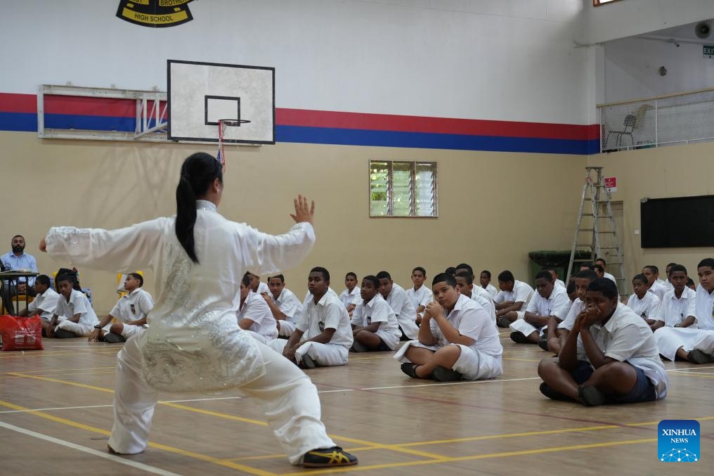 An inheritor of Chen-style Taijiquan from China teaches local Fijian students during a cultural exchange event held by the Confucius Institute at the University of the South Pacific in Suva, Fiji, on June 4, 2026. (Xinhua/Bai Yongquan)