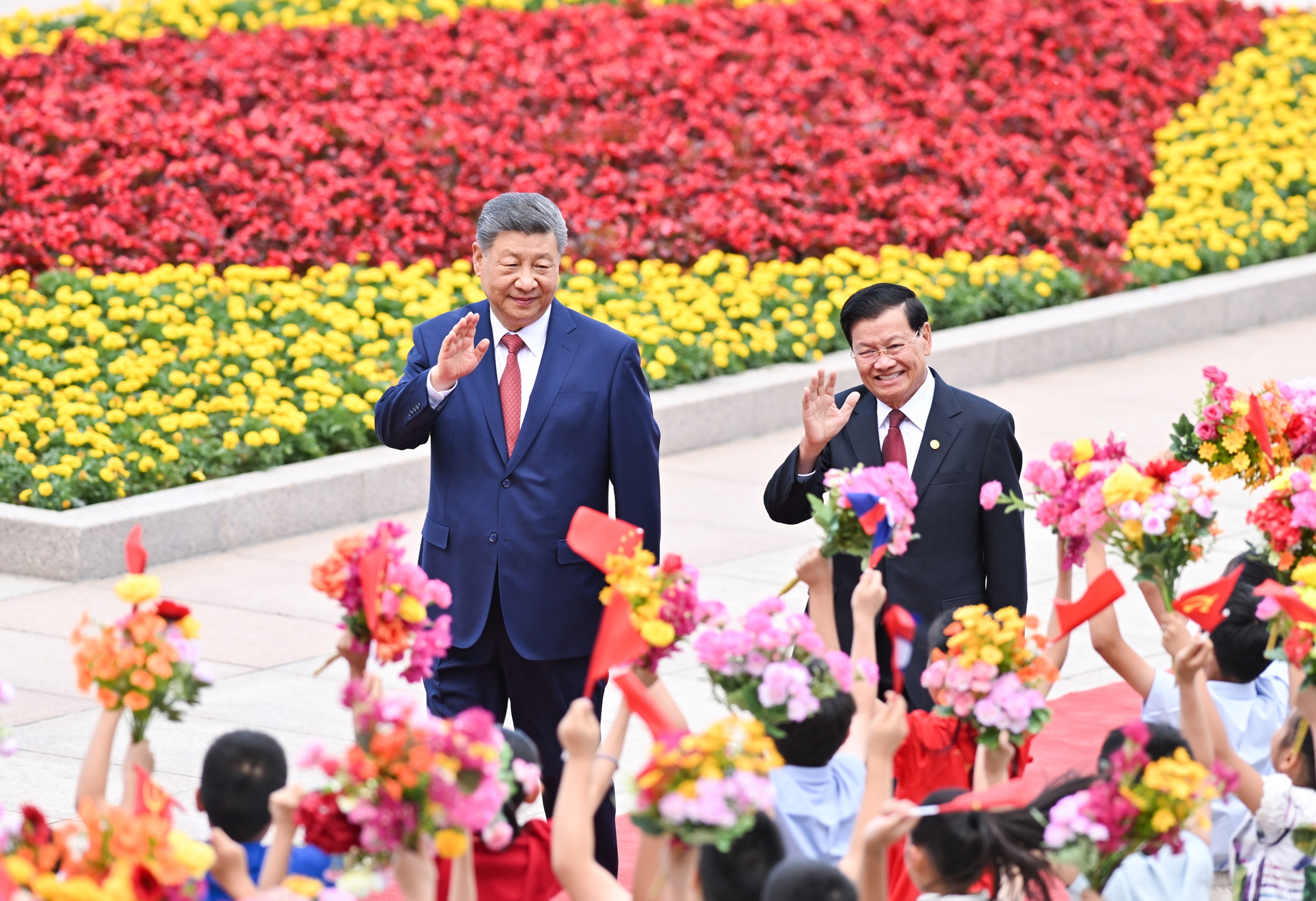 General Secretary of the Communist Party of China Central Committee and Chinese President Xi Jinping holds a welcome ceremony for General Secretary of the Lao People's Revolutionary Party Central Committee and Lao President Thongloun Sisoulith at the square outside the east gate of the Great Hall of the People ahead of their talks in Beijing, June 5, 2026. Photo: Xinhua