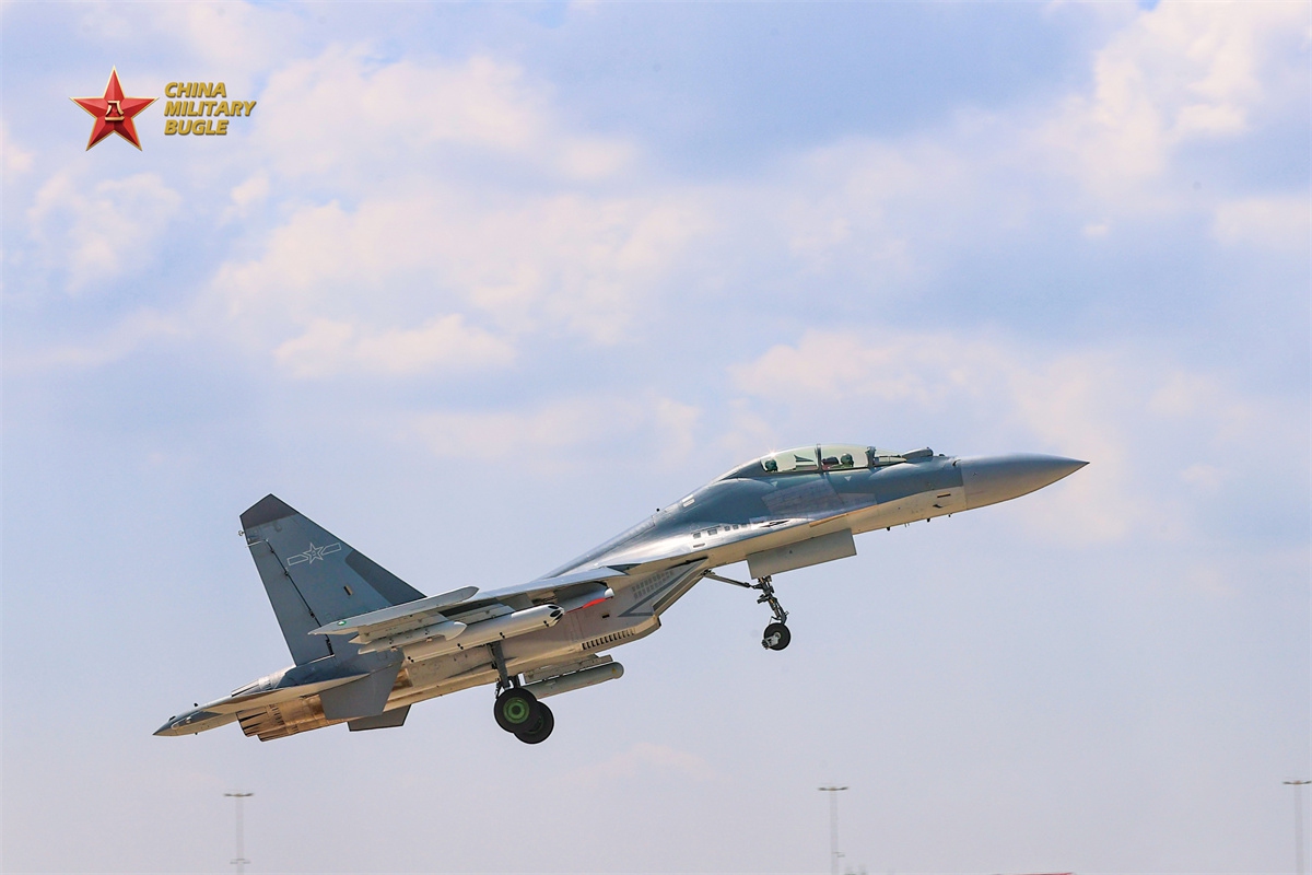 A J-16 fighter jet attached to an aviation troop with the air force under the Chinese PLA Eastern Theater Command soars up into sky during a recent multi-sortie flight training exercise. (eng.chinamil.com.cn/Photo by Xing Zhitao)