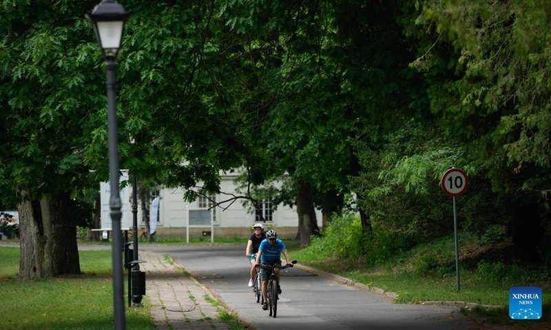 Cyclists ride through the Jablonna Palace complex near Warsaw, Poland on June 5, 2026. The Jablonna Palace is a notable neoclassical palace complex about 20 kilometers north of Warsaw. (Photo: Xinhua)