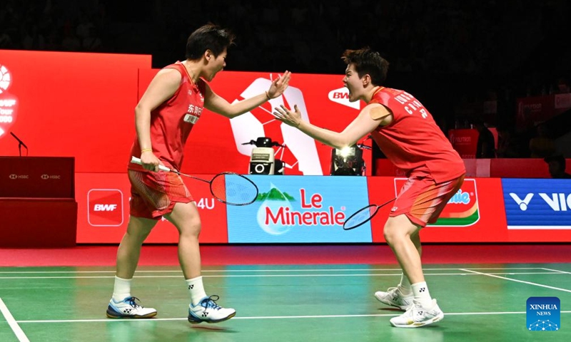 Liu Shengshu (R)/Tan Ning celebrate during the women's doubles semifinal match between Liu Shengshu/Tan Ning of China and Rachel Allessya Rose/Febi Setianingrum of Indonesia at the Indonesia Open 2026 badminton tournament in Jakarta, Indonesia, June 6, 2026. (Xinhua/Veri Sanovri)