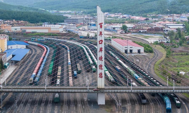 A drone photo taken on June 6, 2026 shows China-Europe freight trains parking at the Suifenhe Station in Suifenhe, northeast China's Heilongjiang Province. (Photo by Qu Yiwei/Xinhua)