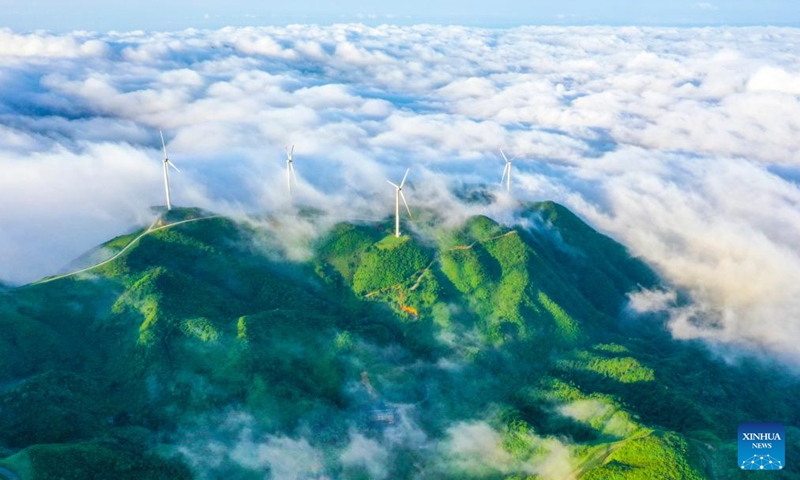 An aerial drone photo taken on June 6, 2026 shows the scenery of a sea of clouds after rain in Tashan Yao Township, Changning City, central China's Hunan Province. (Photo by Zhou Xiuyuchun/Xinhua)