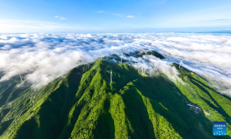 An aerial drone photo taken on June 6, 2026 shows the scenery of a sea of clouds after rain in Tashan Yao Township, Changning City, central China's Hunan Province. (Photo by Zhou Xiuyuchun/Xinhua)