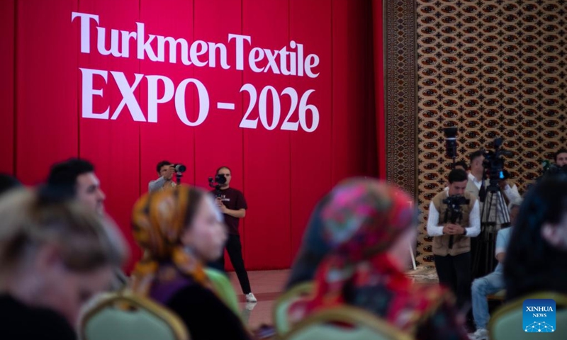 Journalists cover a fashion show during the Turkmen Textile Expo 2026 in Ashgabat, Turkmenistan, June 4, 2026. (Photo by Cui Jiaxin/Xinhua)