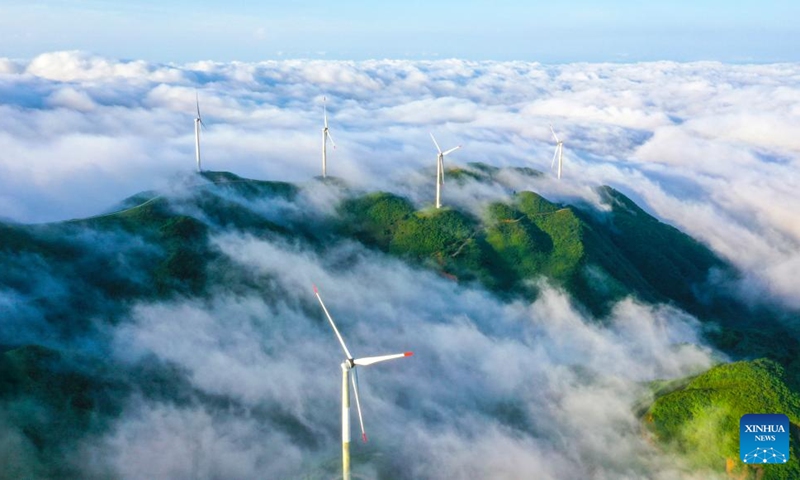 An aerial drone photo taken on June 6, 2026 shows the scenery of a sea of clouds after rain in Tashan Yao Township, Changning City, central China's Hunan Province. (Photo by Zhou Xiuyuchun/Xinhua)
