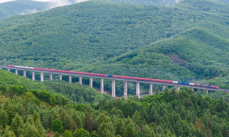 A drone photo taken on June 6, 2026 shows a China-Europe freight train arriving at the Suifenhe port, northeast China's Heilongjiang Province. (Photo by Qu Yiwei/Xinhua)