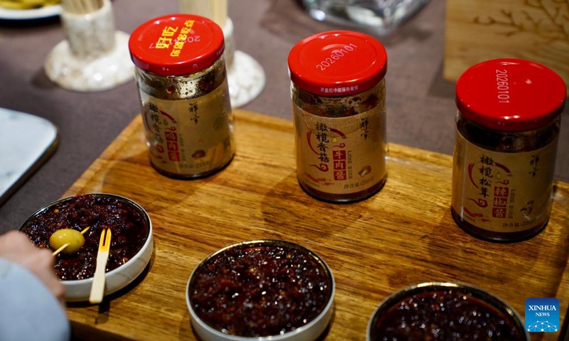This photo taken on June 7, 2026 shows olive oil food condiments at an olive processing company in Wudu District, Longnan, northwest China's Gansu Province.
Wudu District in Longnan is one of China's prime areas for olive cultivation, with its olive industry leading the nation in scale, output and economic returns.
By 2025, the olive plantation area of Wudu District covered about 42,800 hectares, generating a total output value of four billion yuan (about 591 million U.S. dollars).
The district has developed a comprehensive olive industry chain which incorporates over 80 products across 10 major categories, including olive oil, health supplements, and skincare items. Photo: Xinhua
