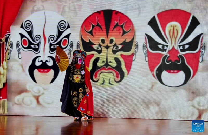 A competitor performs Sichuan Opera face-changing during the final of the 2026 Chinese Bridge Language Proficiency Competition in Dubai, the United Arab Emirates (UAE), June 6, 2026. Photo: Xinhua