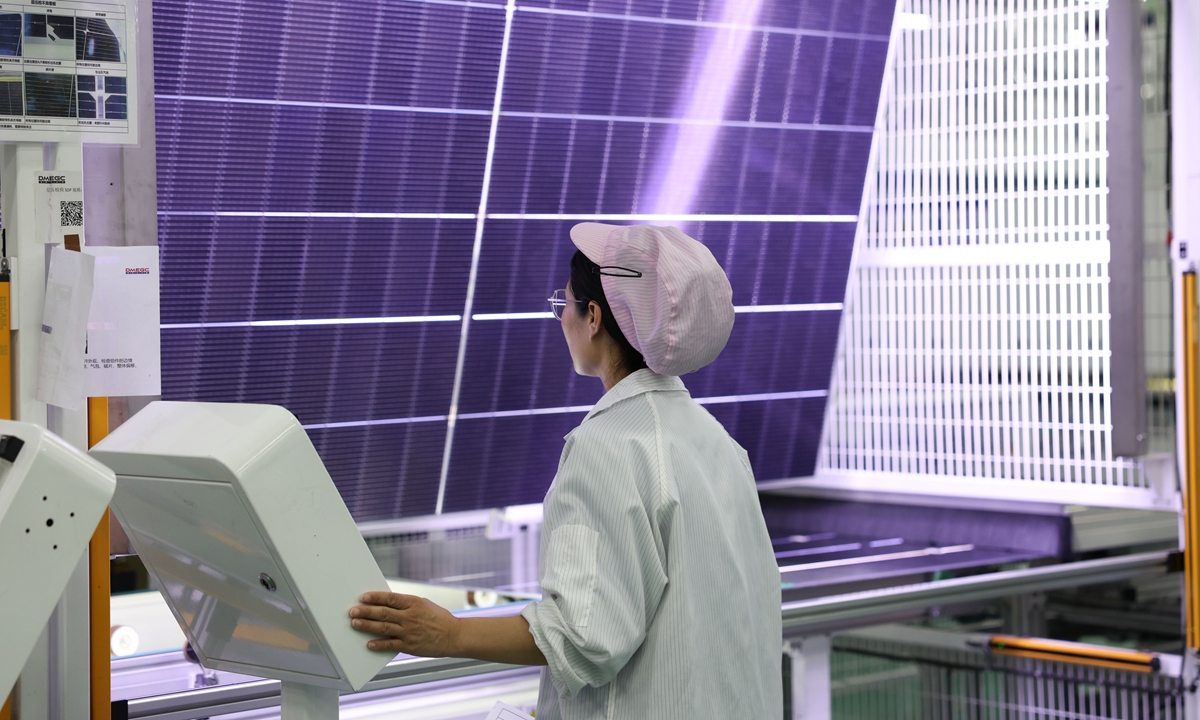 A worker at a new-energy enterprise in a local development zone steps up production of solar photovoltaic (PV) modules for export markets on June 8, 2026, in Lianyungang, East China's Jiangsu Province. Customs data shows that China's cumulative export volume of PV products increased by about 43 percent year-on-year in the first four months of this year. Photo: VCG
