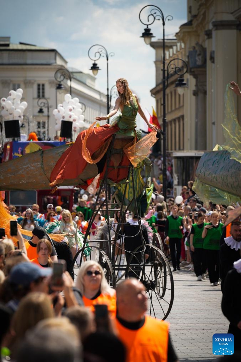 A performer in a themed costume takes part in the fifth Warsaw Mermaid Parade in Warsaw, Poland, June 6, 2026. Photo: Xinhua
