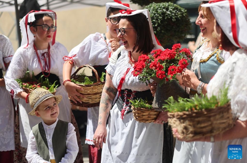 Locals in traditional costumes are seen at 2026 Nemi Strawberry Festival in Nemi, Lazio, Italy, June 7, 2026. (Xinhua/Li Jing)