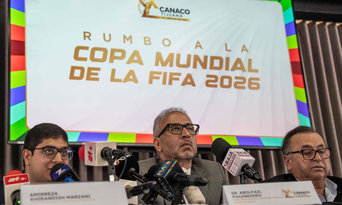 Iran's ambassador to Mexico Abolfazl Pasandideh (center) attends a press conference ahead of the arrival of Iran's national football team for the FIFA 2026 World Cup football tournament in Tijuana, Mexico, on June 6, 2026. Iran lashed out at the US for denying visas to some of its squad support staff. Photo: AFP