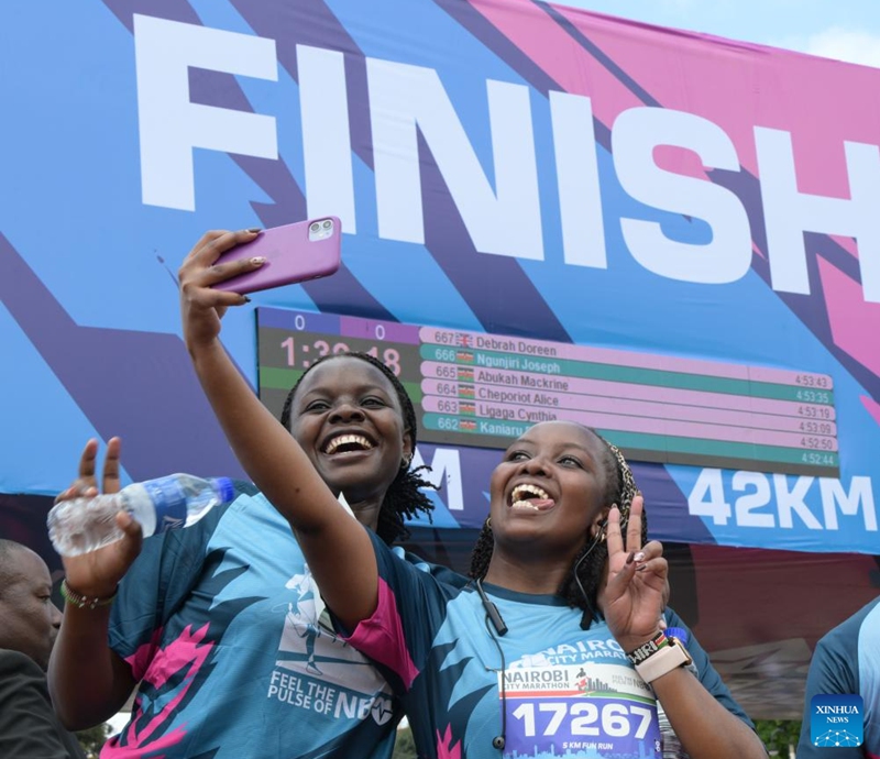 A lady takes a selfie after the Nairobi City Marathon in Nairobi, Kenya, June 7, 2026. (Xinhua/Yang Guang)